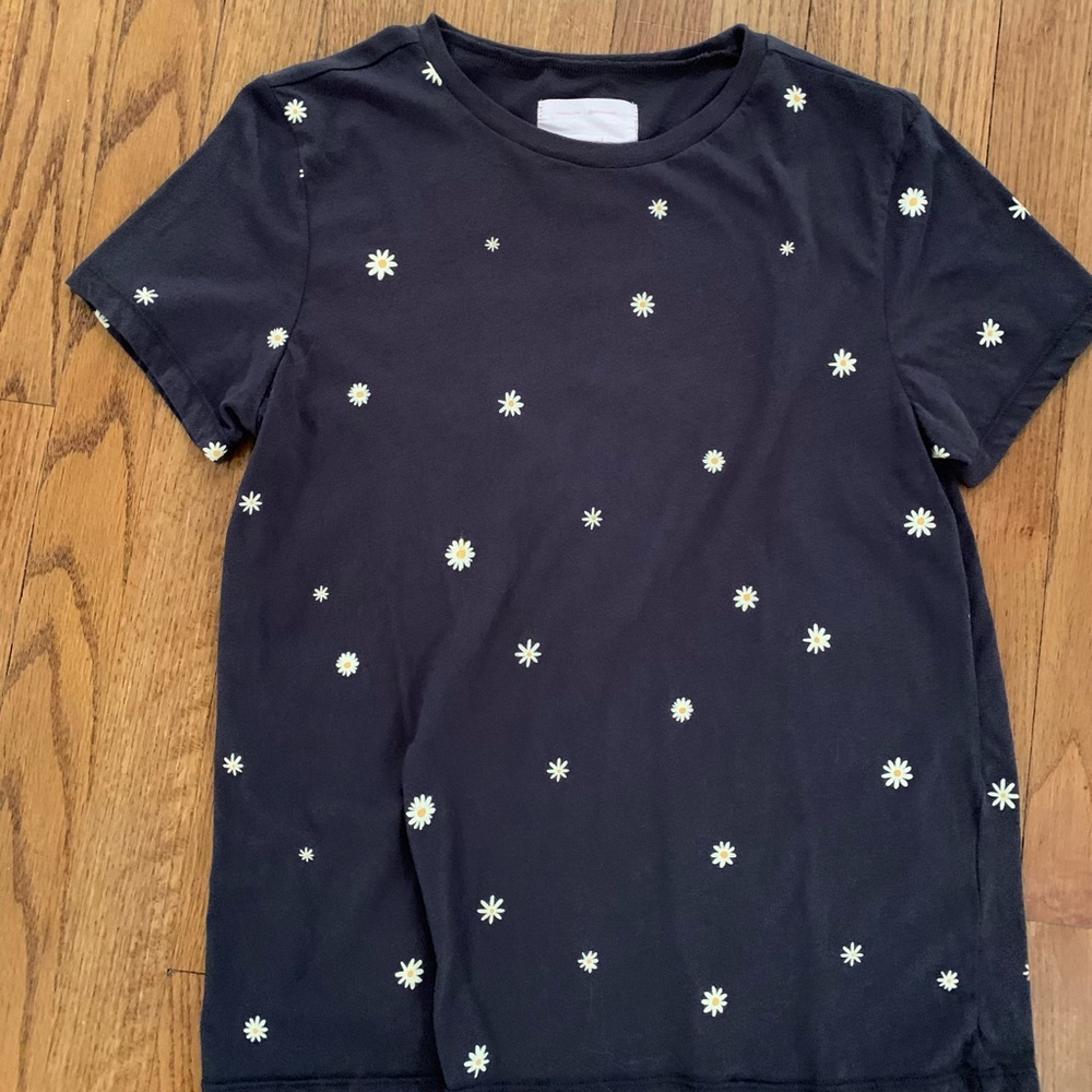 black shirt with little flowers on it
